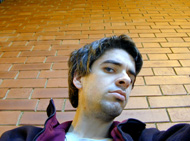 stephen with brick wall